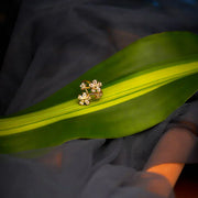 Gold Floral white stone studded Adorable finger Ring